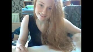 Redhead schoolgirl fingers her wet cunt and ass