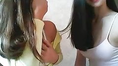 Two lovely asian cam girls flash their naked bodies