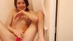 Small breasted girl squirts in the shower