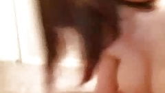 Chubby girl with big low hangers does show