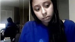 Shy latina briefly shows off her hairy twat